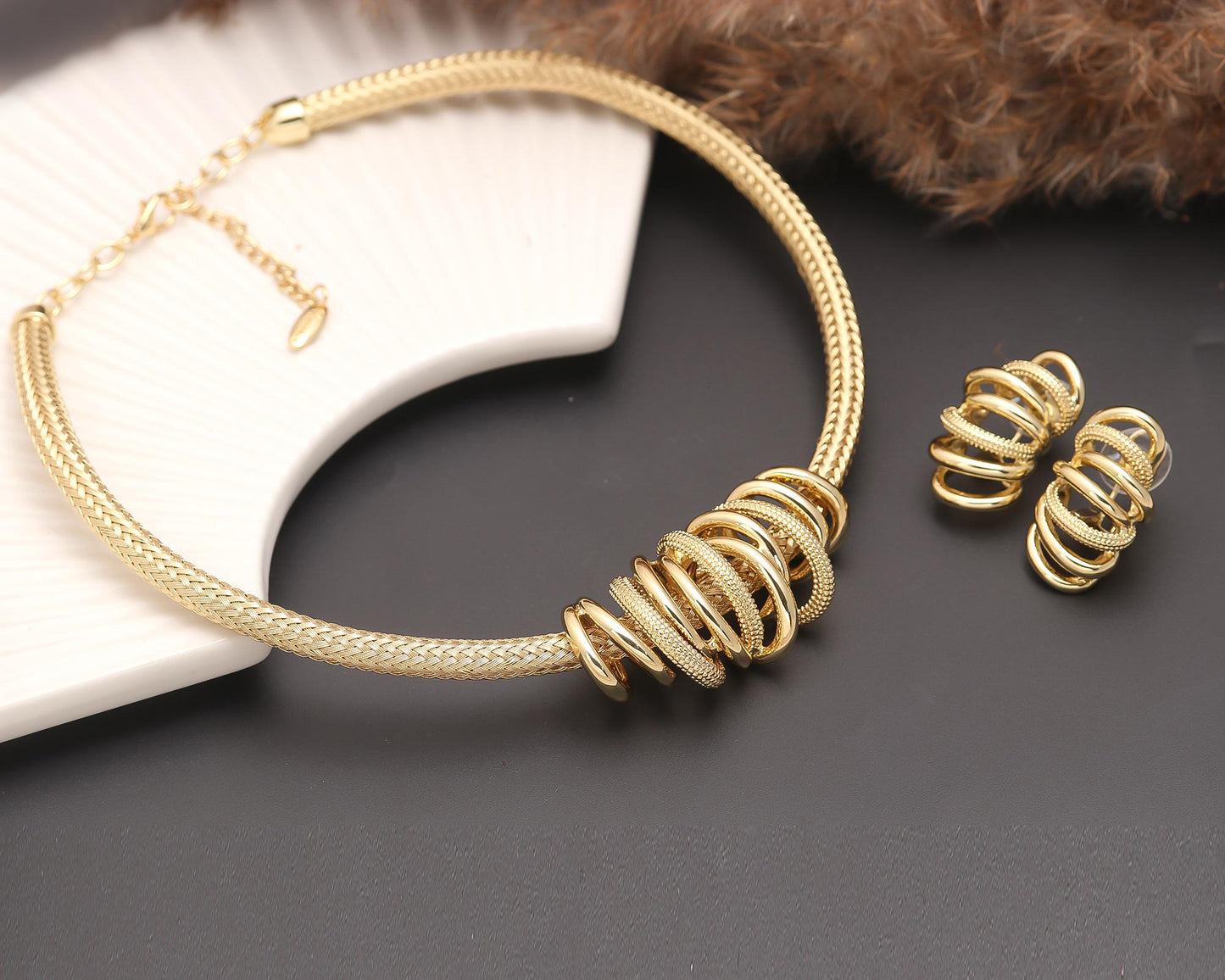 Gold-Plated Statement Choker Necklace with Stacked Ring Detailing and Matching Earrings – Contemporary Jewelry Set