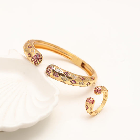 Gold-Tone Ruby Crown Charm Openable  Bracelet and Matching Ring Set with Red and White Stone Accents | Designer Statement Jewelry for Festive and Elegant Occasions