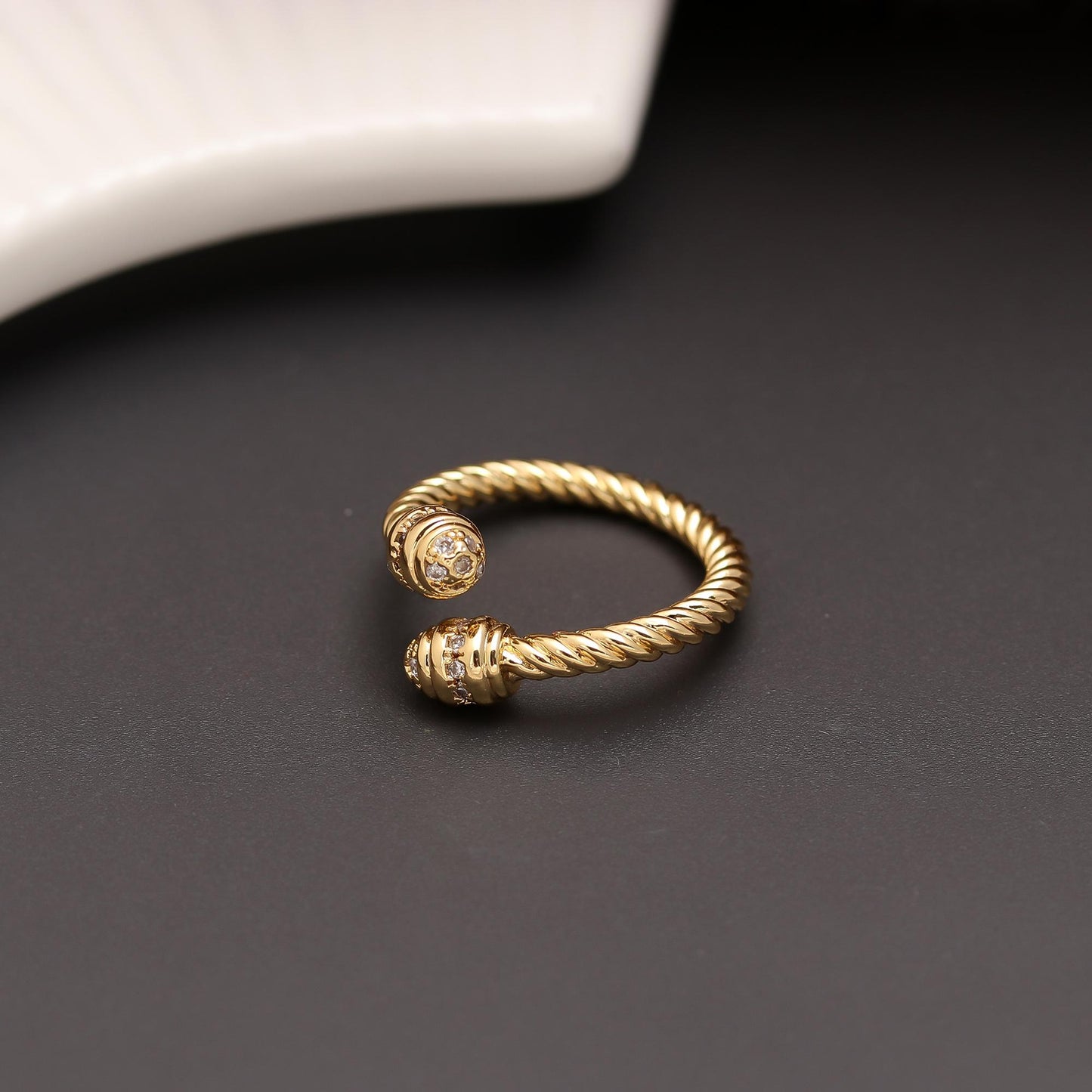 Twist Elegance Ring with Rope-Style Gold Band and Dual Diamond Look Accents | Contemporary Statement Jewelry