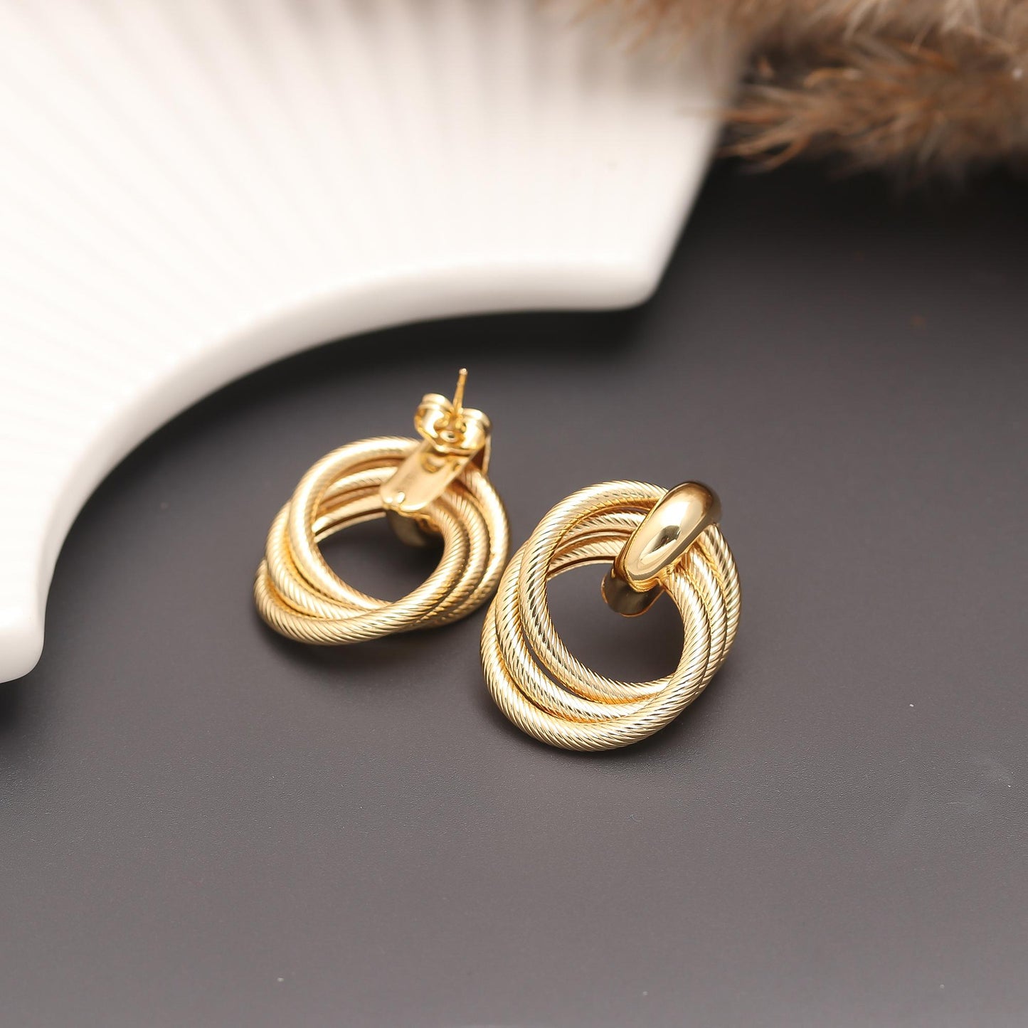 Modern Gold-Plated Interlocking Circle Earrings with Textured Rope Detailing, Polished Top Accent, and Contemporary Minimalist Design for Versatile Style