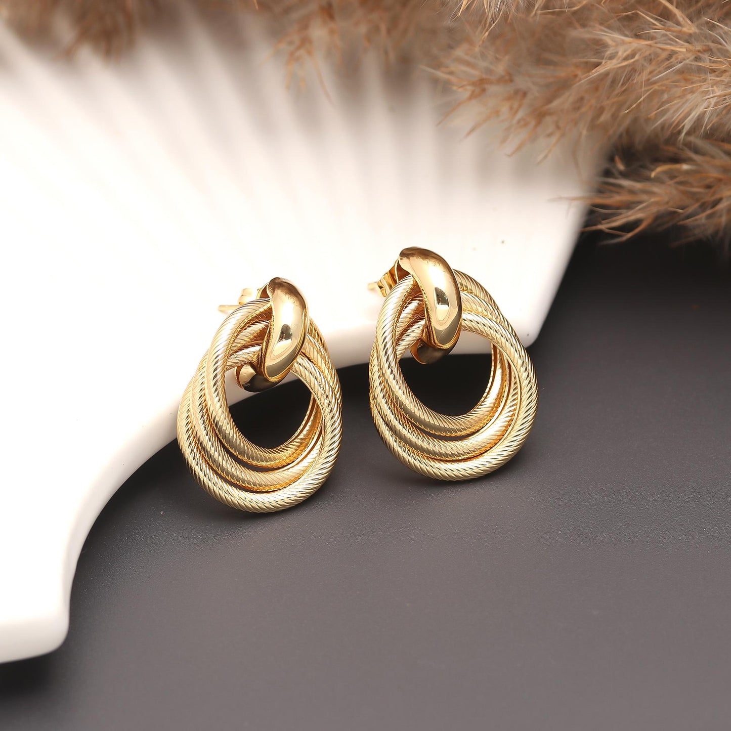 Modern Gold-Plated Interlocking Circle Earrings with Textured Rope Detailing, Polished Top Accent, and Contemporary Minimalist Design for Versatile Style