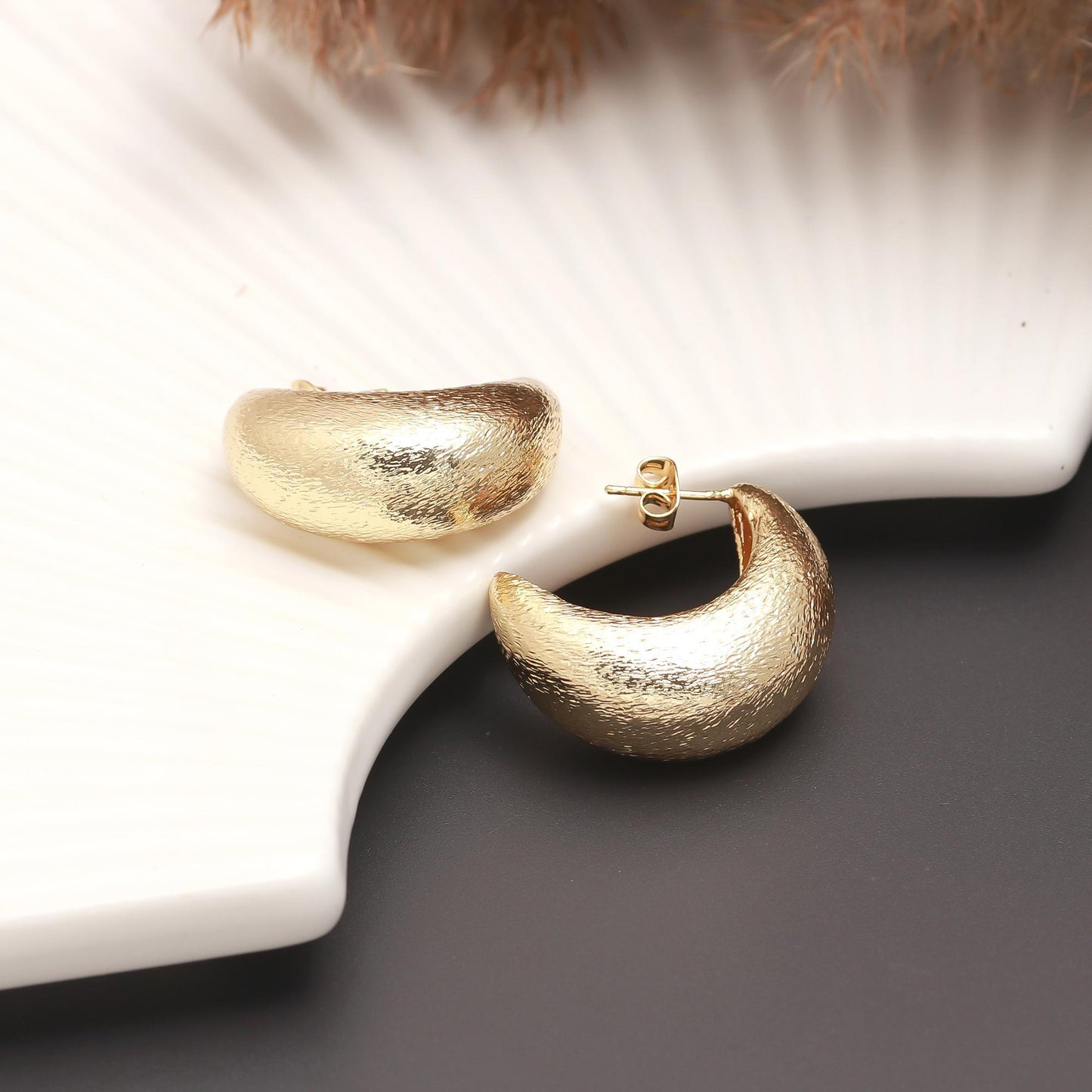 Crescent-Shaped Textured Gold-Tone Earrings – Elegant Statement Hoops for Modern and Festive Styling