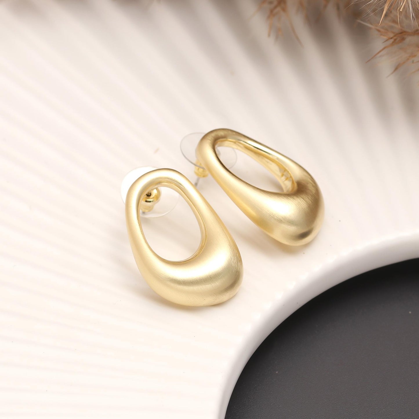 Gold-Plated Abstract Hollow Oval Stud Earrings with Polished Smooth Finish for Minimalist Contemporary Statement Style