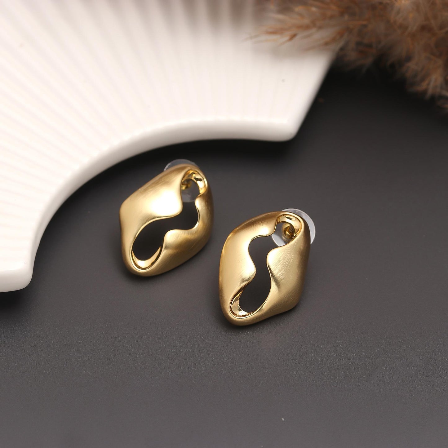 Gold-Plated Abstract Hollow Stud Earrings with Organic Curved Silhouette and Polished Finish for Contemporary Minimalist Elegance