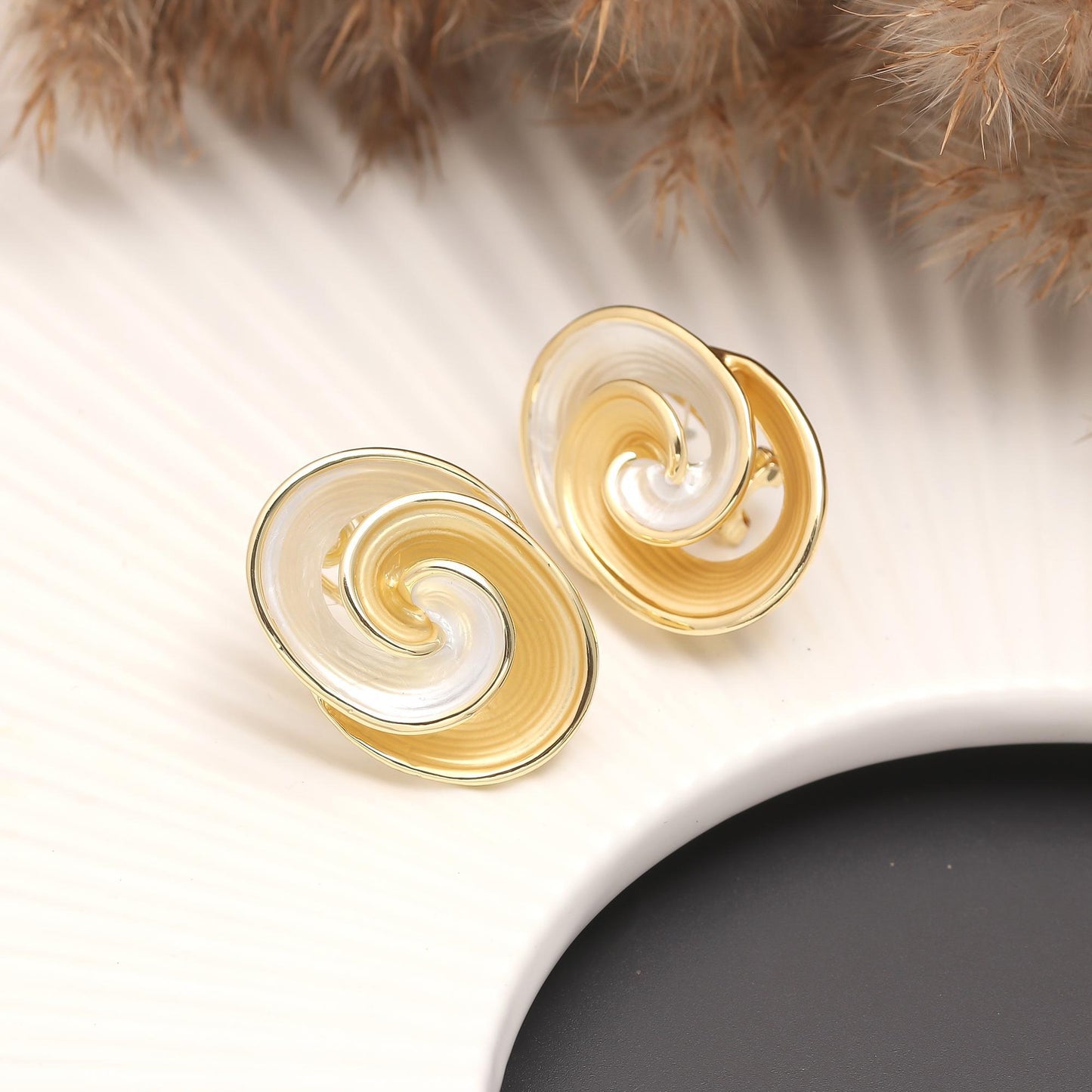 Gold-Plated Dual-Tone Swirl Stud Earrings with Glossy Polished Finish and Artistic Spiral Design for Modern Elegance