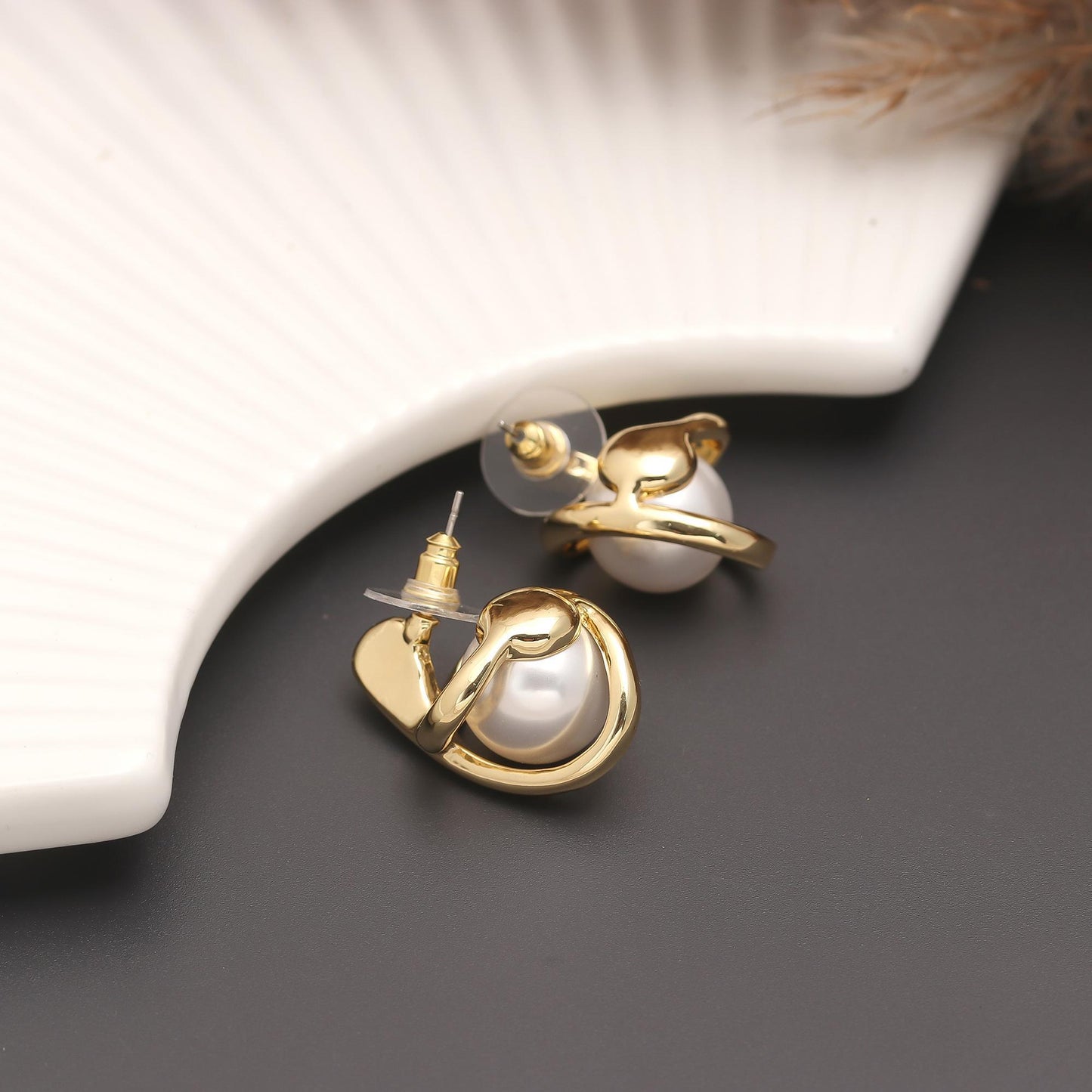 Gold-Plated Pearl Stud Earrings with Crisscross Bar Detailing and Polished Finish for Timeless Grace and Modern Sophistication