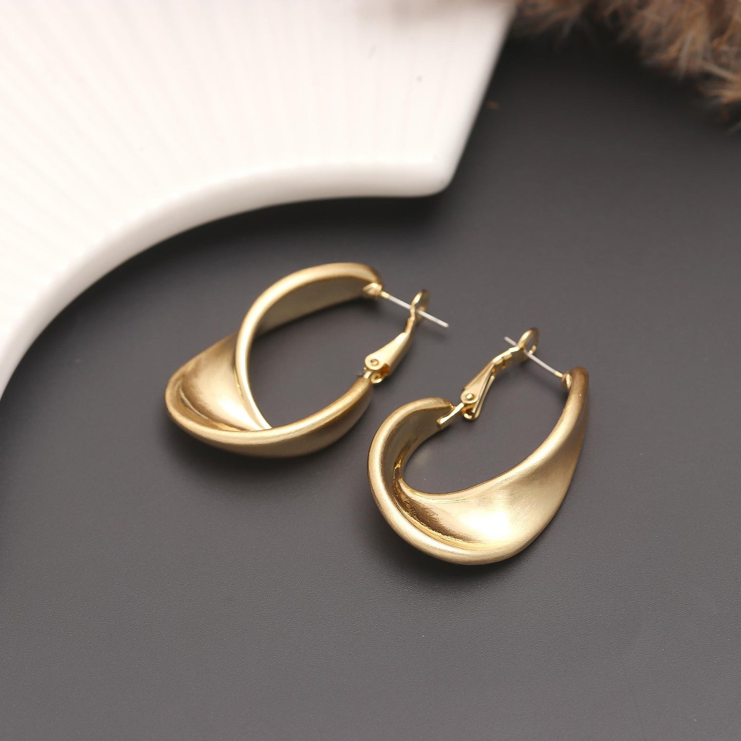 Gold-Plated Sleek Teardrop Hoop Earrings with Smooth Curved Silhouette and Glossy Finish for Modern Minimalist Glamour