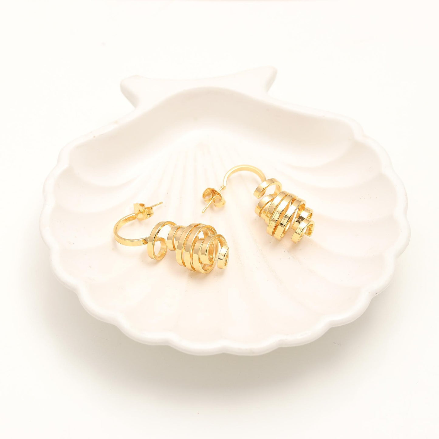 Contemporary Gold-Plated Spiral Drop Earrings with Layered Loops, Cascading Design, and Polished Finish for Modern Elegance and Statement Style