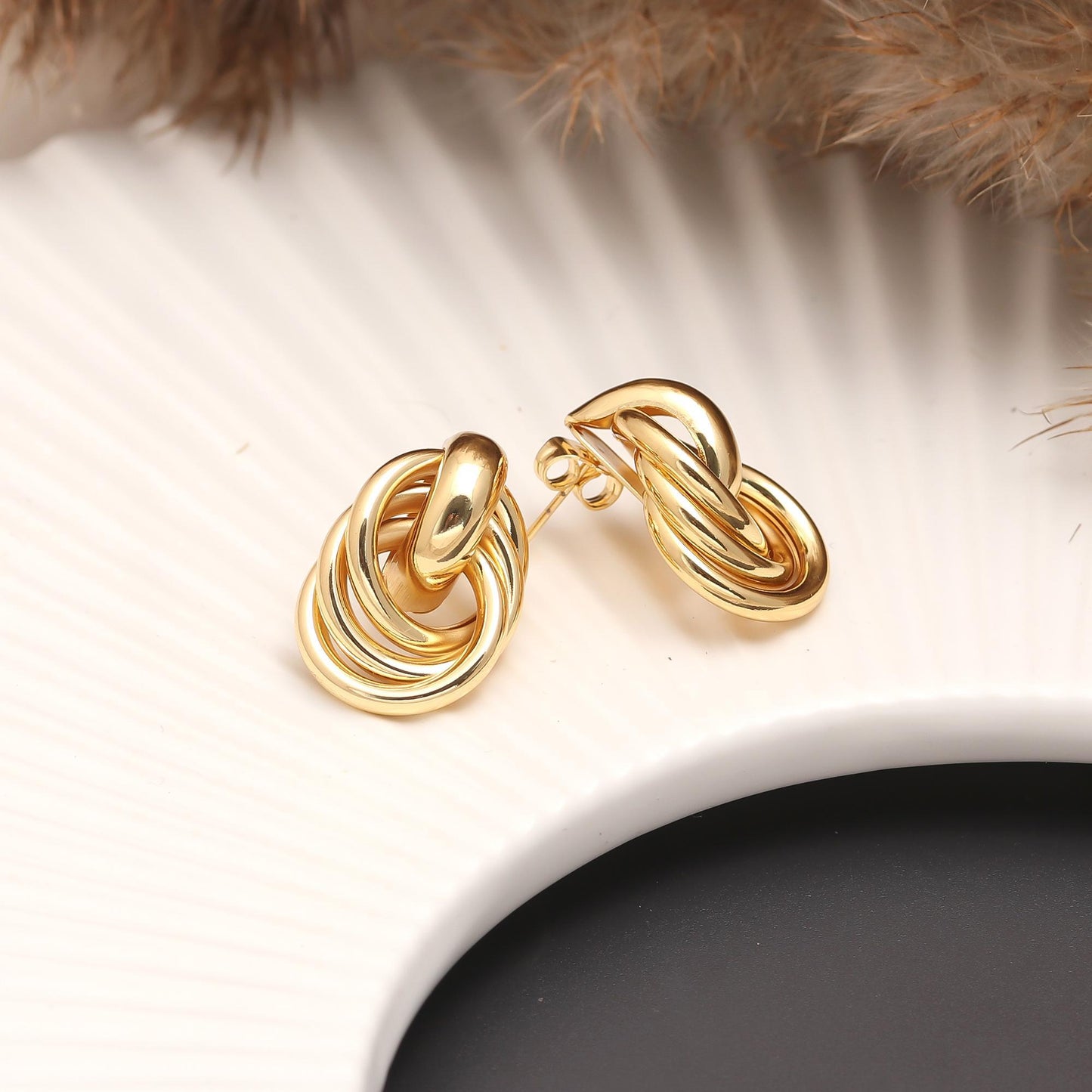 Gold-Plated Interlinked Multi-Ring Stud Earrings with Polished High-Shine Finish for Modern Statement and Versatile Styling