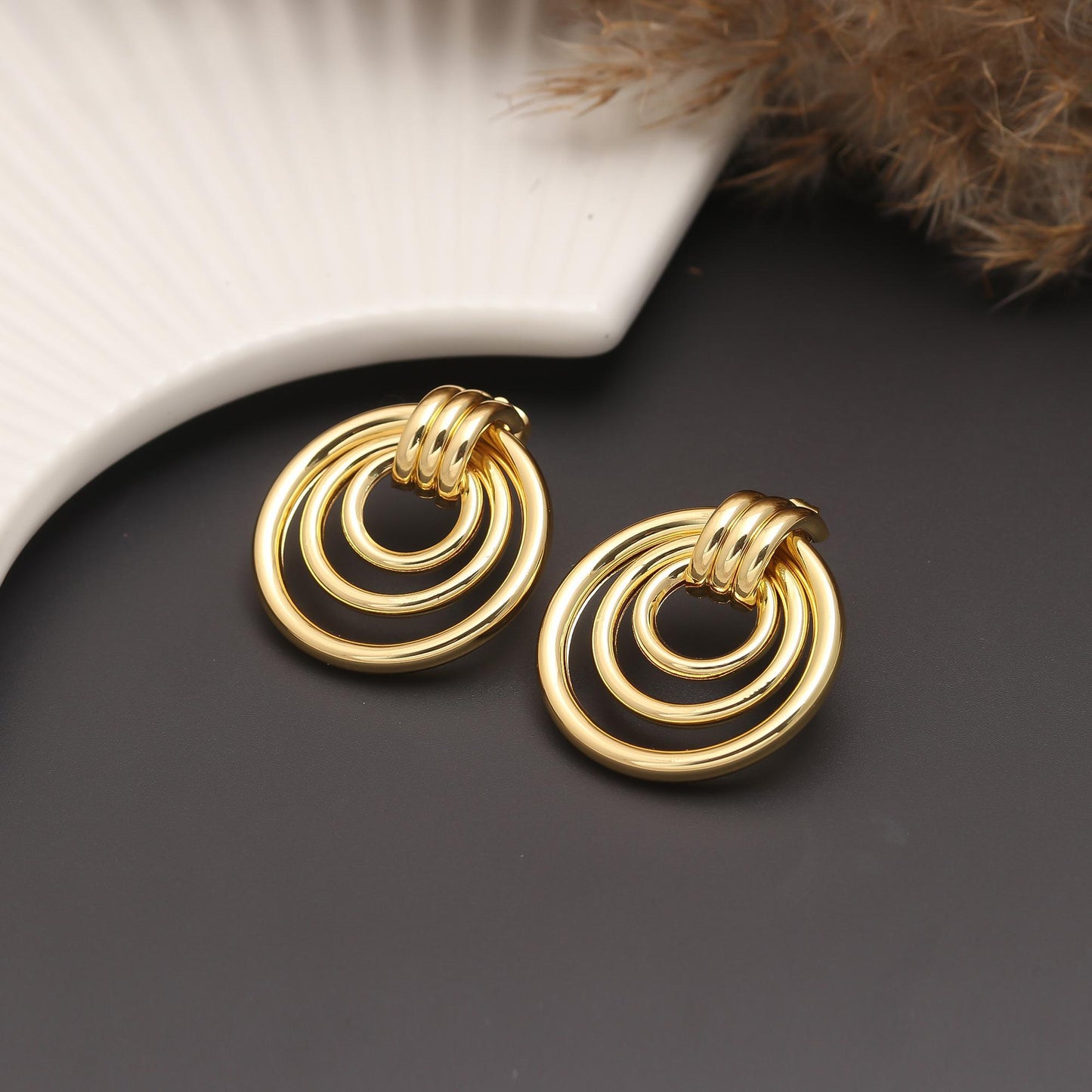 Contemporary Gold-Plated Triple Hoop Circle Earrings with Interlinked Concentric Rings for Modern Elegance and Timeless Style