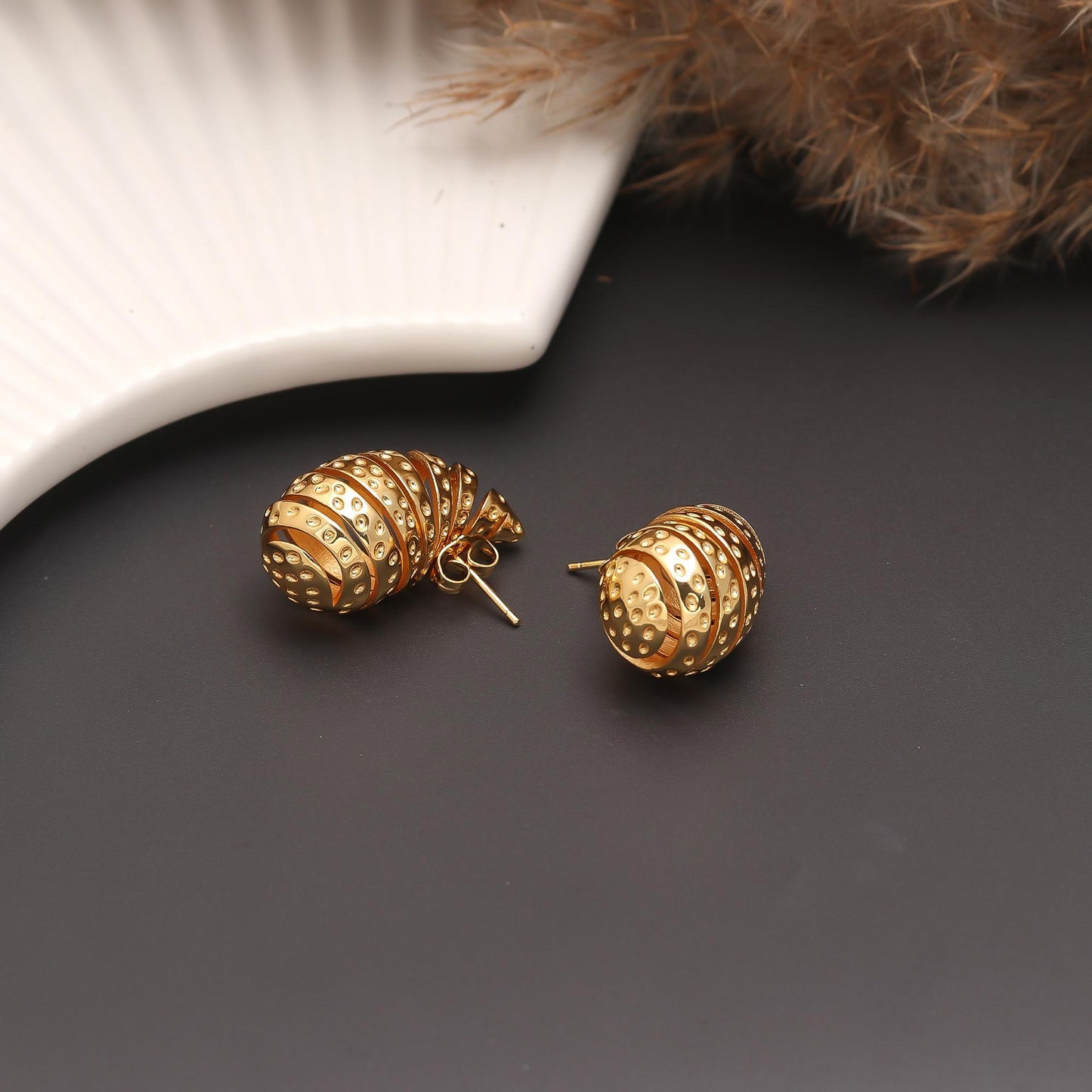 Gold-Plated Spiral Drop Earrings with Layered Teardrop Silhouette and Cutout Detailing for Bold Festive Glamour