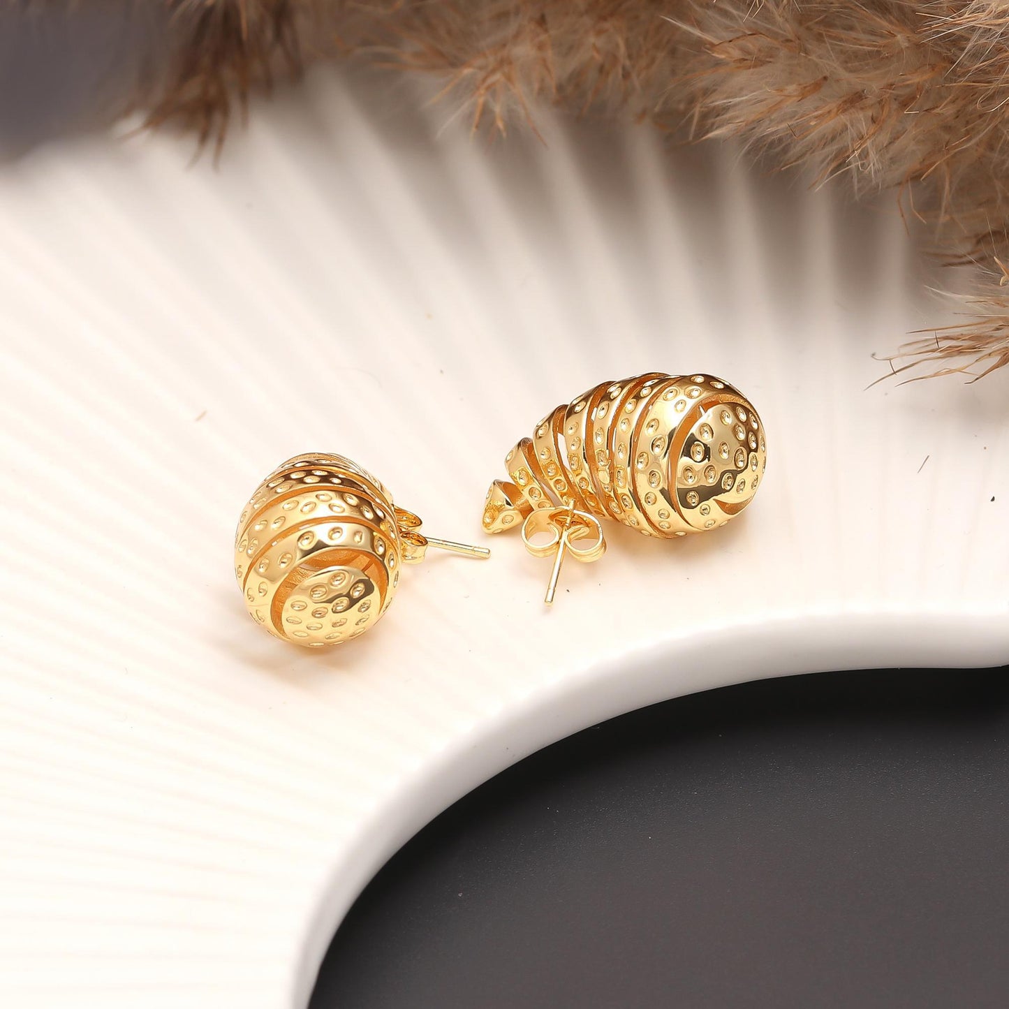 Gold-Plated Spiral Drop Earrings with Layered Teardrop Silhouette and Cutout Detailing for Bold Festive Glamour