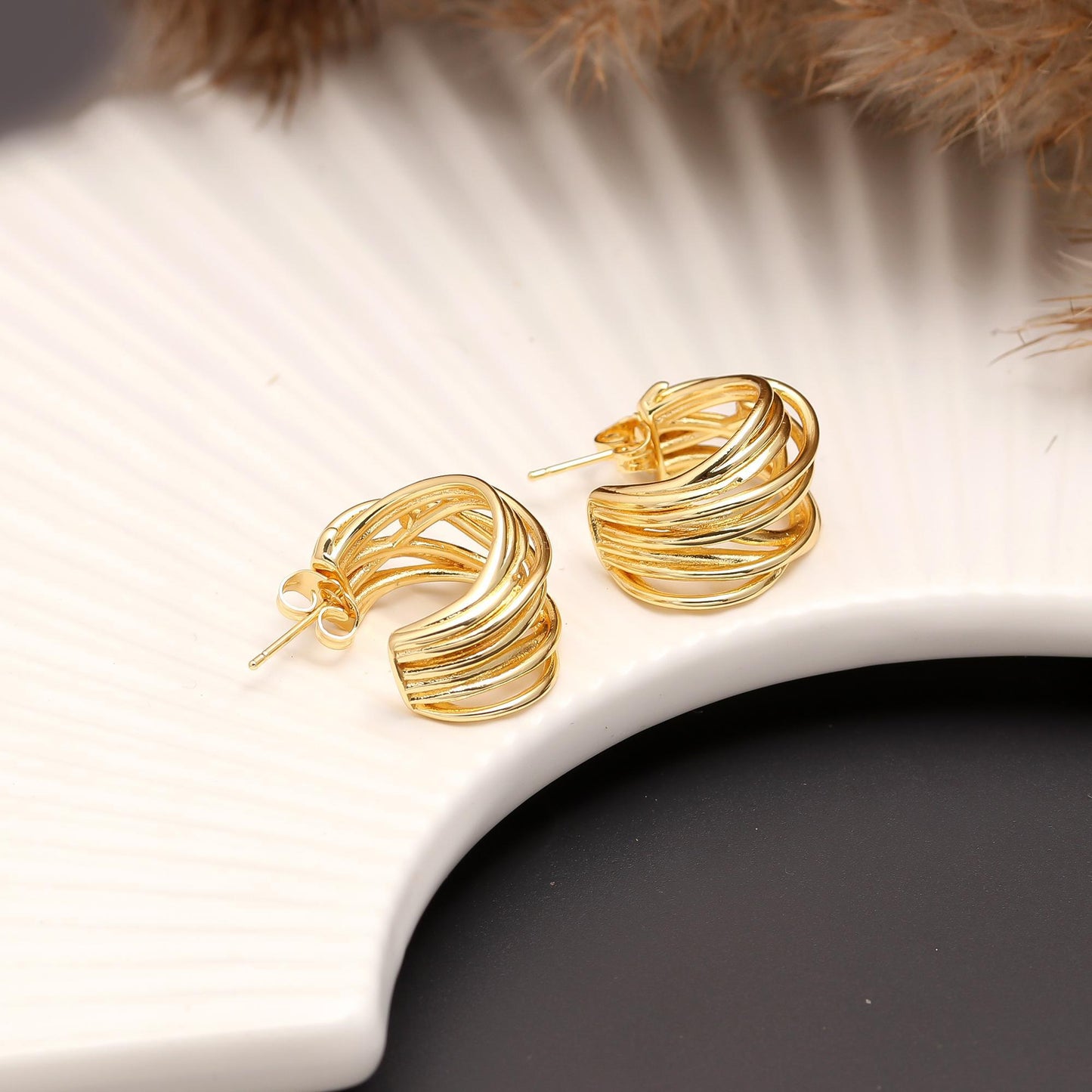 Elegant Gold-Plated Twisted Hoop Earrings with Interwoven Layers, Polished Finish, and Contemporary Statement Design for Everyday Glamour