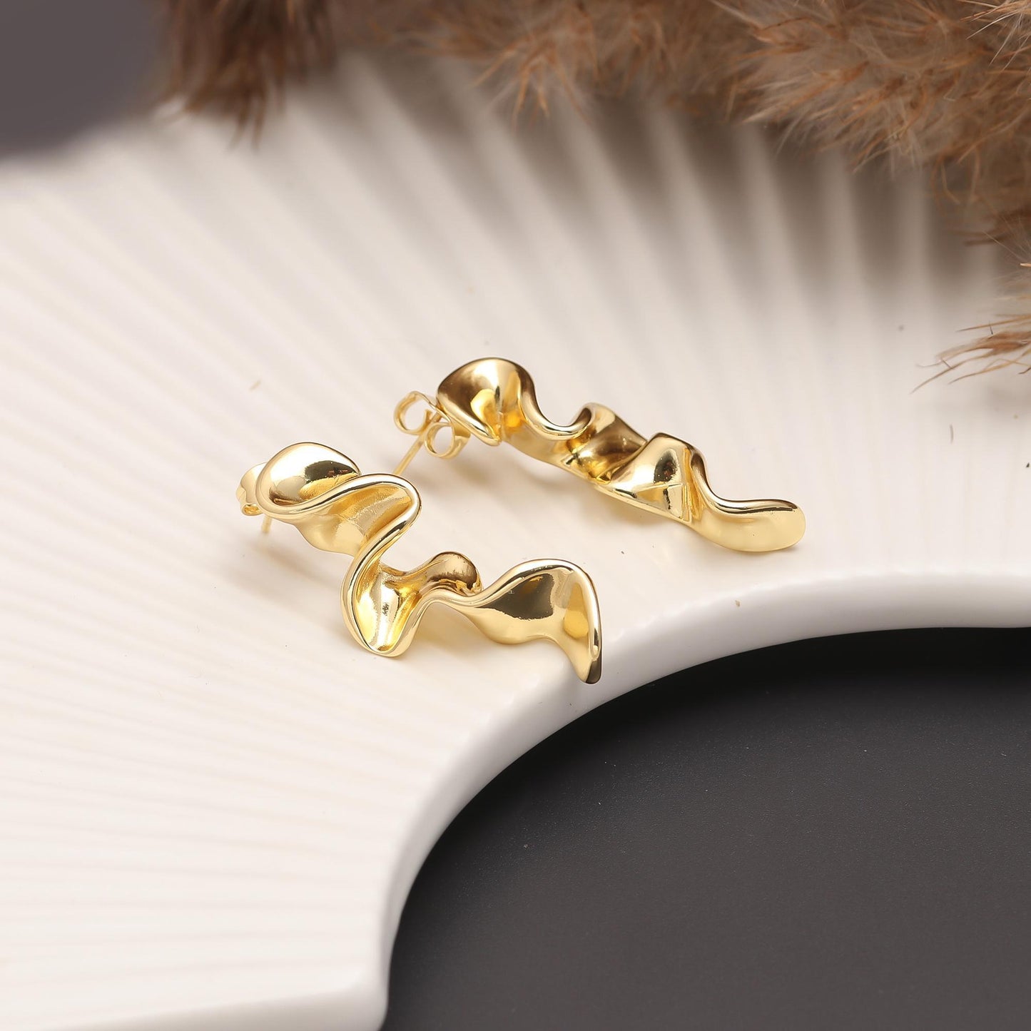 Gold-Plated Fluid Wave Dangling Earrings with Organic Curves and Polished Finish for Bold Contemporary Statement Style