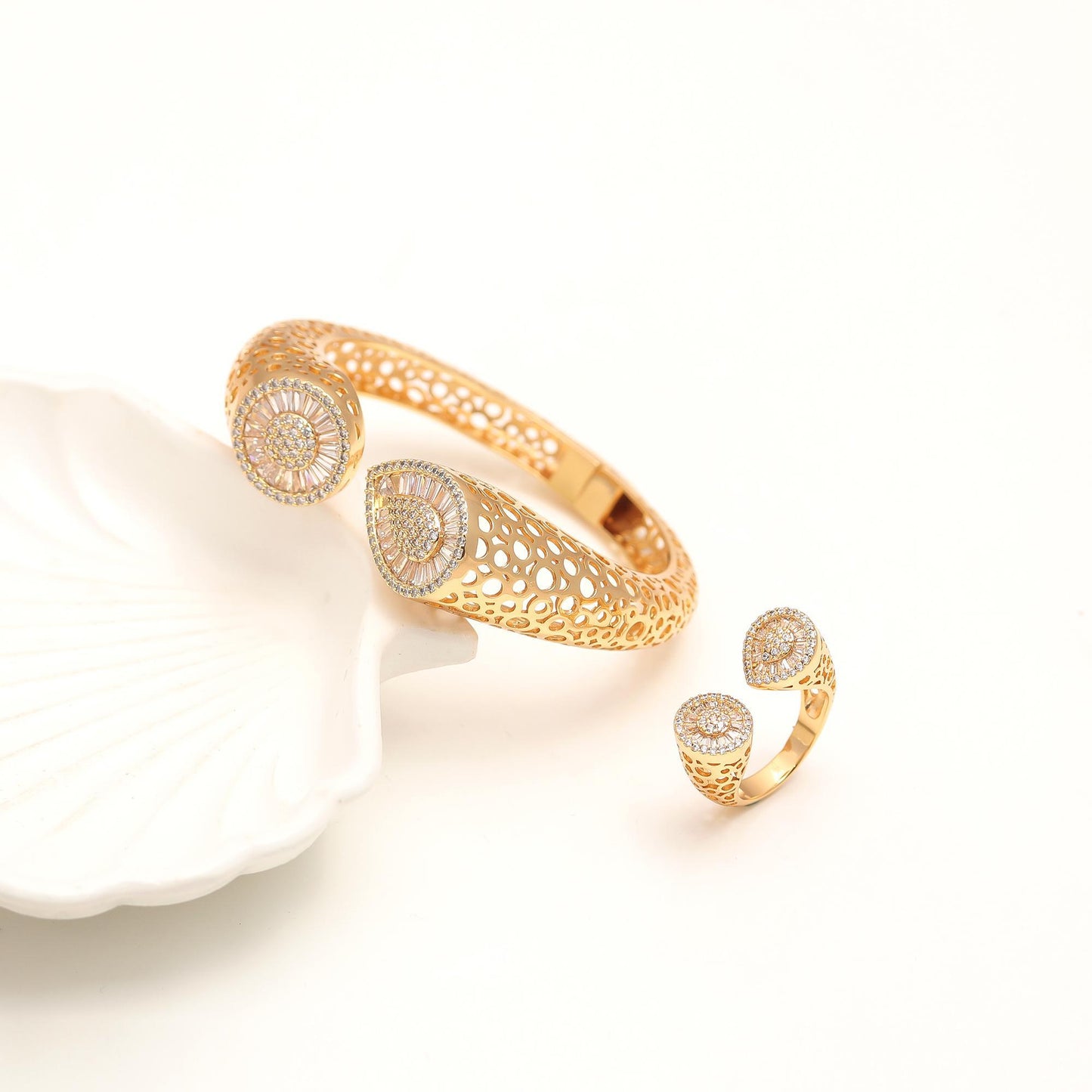 Gold Finish Openwork Bracelet and Matching Ring Set with Teardrop Diamond Look Pavé Ends | Regal Statement Jewelry for Weddings, Celebrations, and Special Occasions