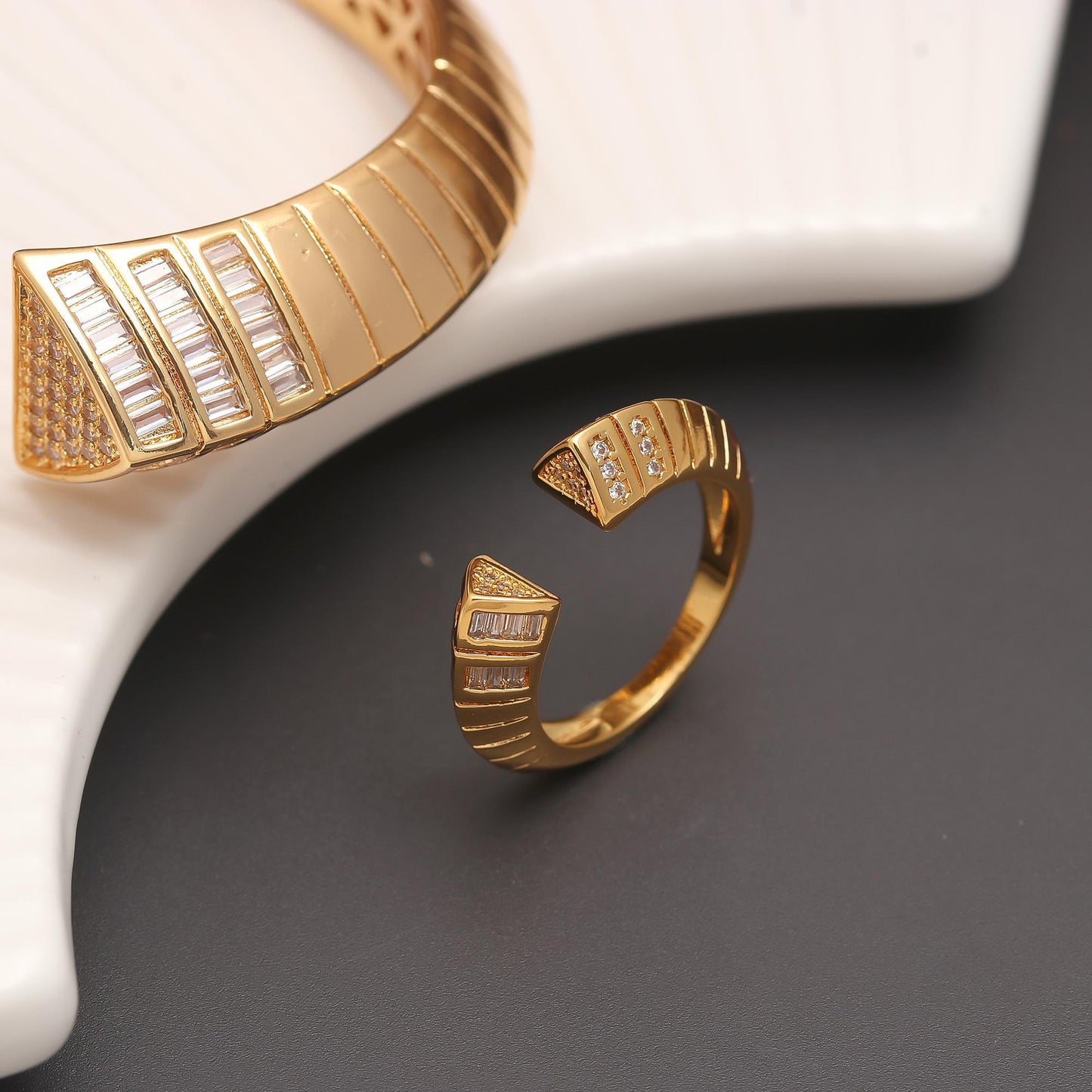 Gold Finish Angular Bracelet and Ring Set with Geometric Diamond Look Detailing | Modern Statement Jewelry for Weddings, Festive Occasions, and Luxury Gifting