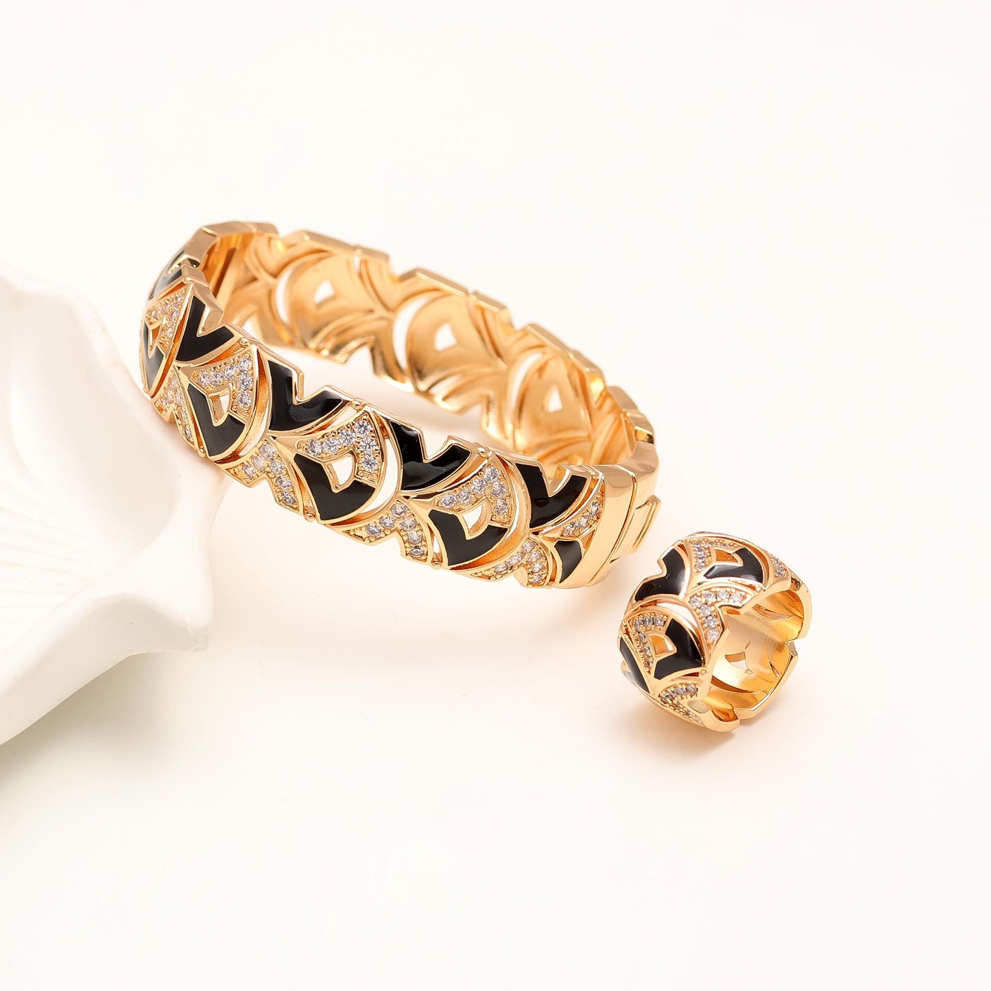 Gold Finish Bracelet and Ring Set with Black Enamel Accents and Diamond Look Paved Detailing | Bold Statement Jewelry for Modern Elegance