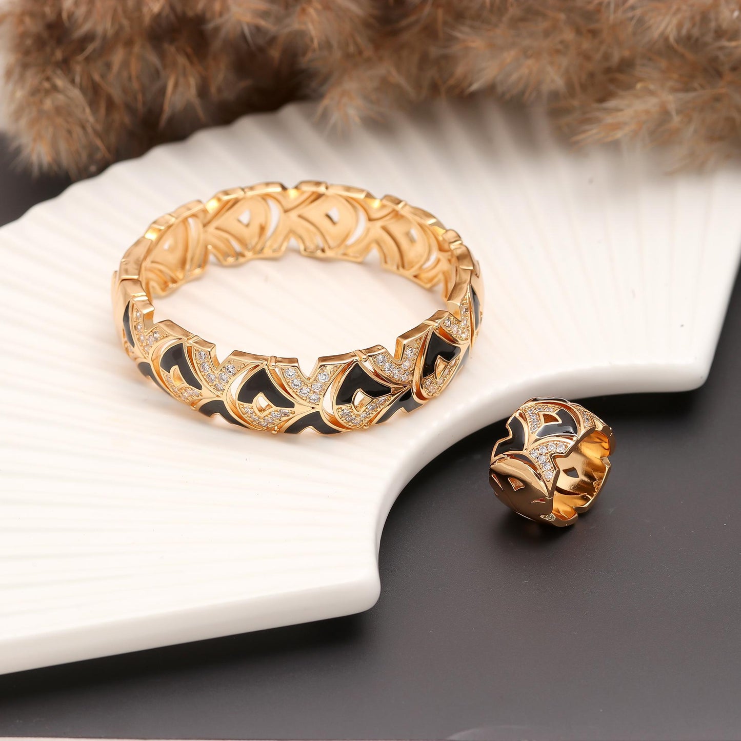 Gold Finish Bracelet and Ring Set with Black Enamel Accents and Diamond Look Paved Detailing | Bold Statement Jewelry for Modern Elegance