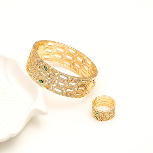 Gold Finish Bracelet and Ring Set with Honeycomb Cutwork, Diamond Look Detailing and Emerald Green Accents | Elegant Statement Jewelry for Festive and Evening Wear