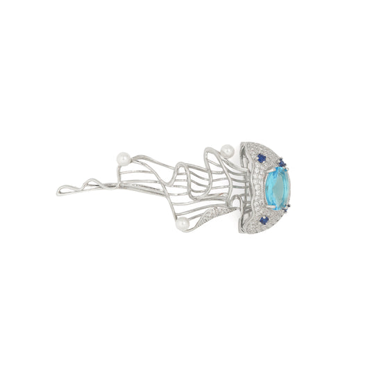 Aquatic Art Pave Brooch | Silver Tone Jellyfish Inspired Brooch with Aquamarine Coloured Center Stone, Blue CZ Accents, Flowing Metal Lines and Pearl Details | Unique Artistic Statement Pin