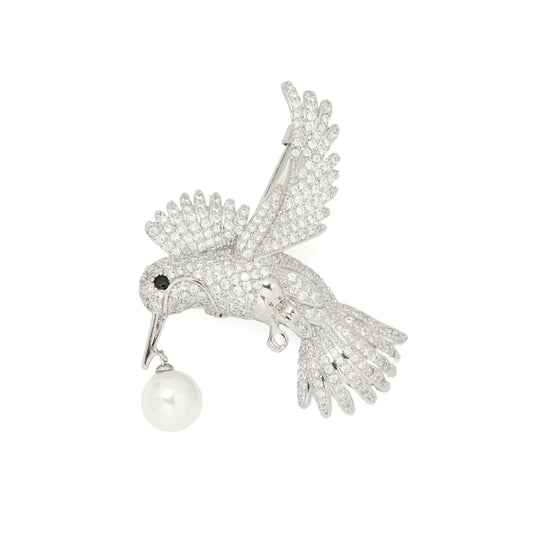 Pave Hummingbird Pearl Brooch | Silver Tone CZ Pave Flying Bird Pin with Black Stone Eye and Dangling Pearl | Elegant Nature Inspired Statement Brooch for Sarees and Formal Wear
