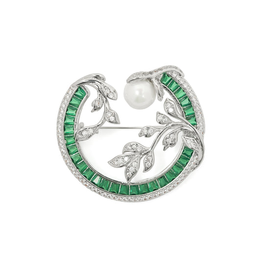 Emerald Wreath and Pearl Brooch | Silver Tone Circular Garland Brooch with Emerald Coloured Channel Set Stones, Pave CZ Leaves and Pearl Accent | Elegant Festive and Bridal Statement Pin