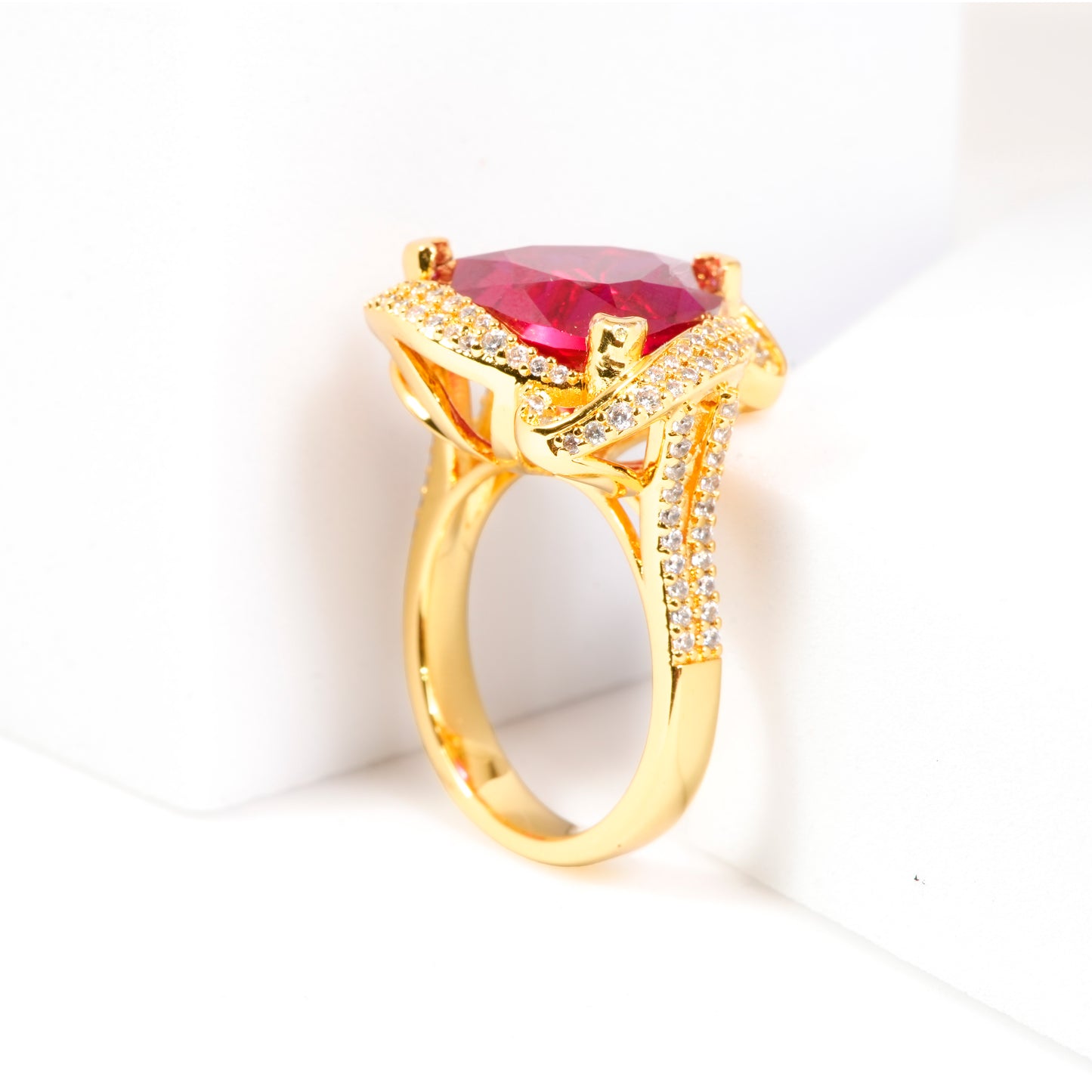Gold Finish Ruby Red Triangle Stone Ring for Women with Diamond Look Swirl Border | Statement Cocktail and Wedding Jewelry