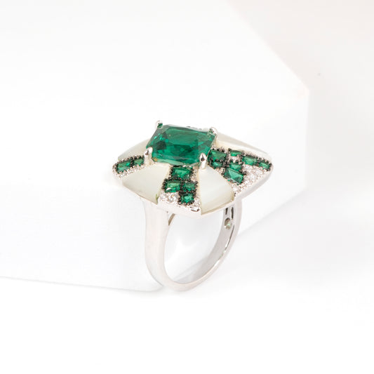 Silver Finish Green Emerald Stone Ring for Women with Unique Cross Design and Diamond Look Detailing | Fashion Statement Jewelry for Wedding, Party, and Festive Wear