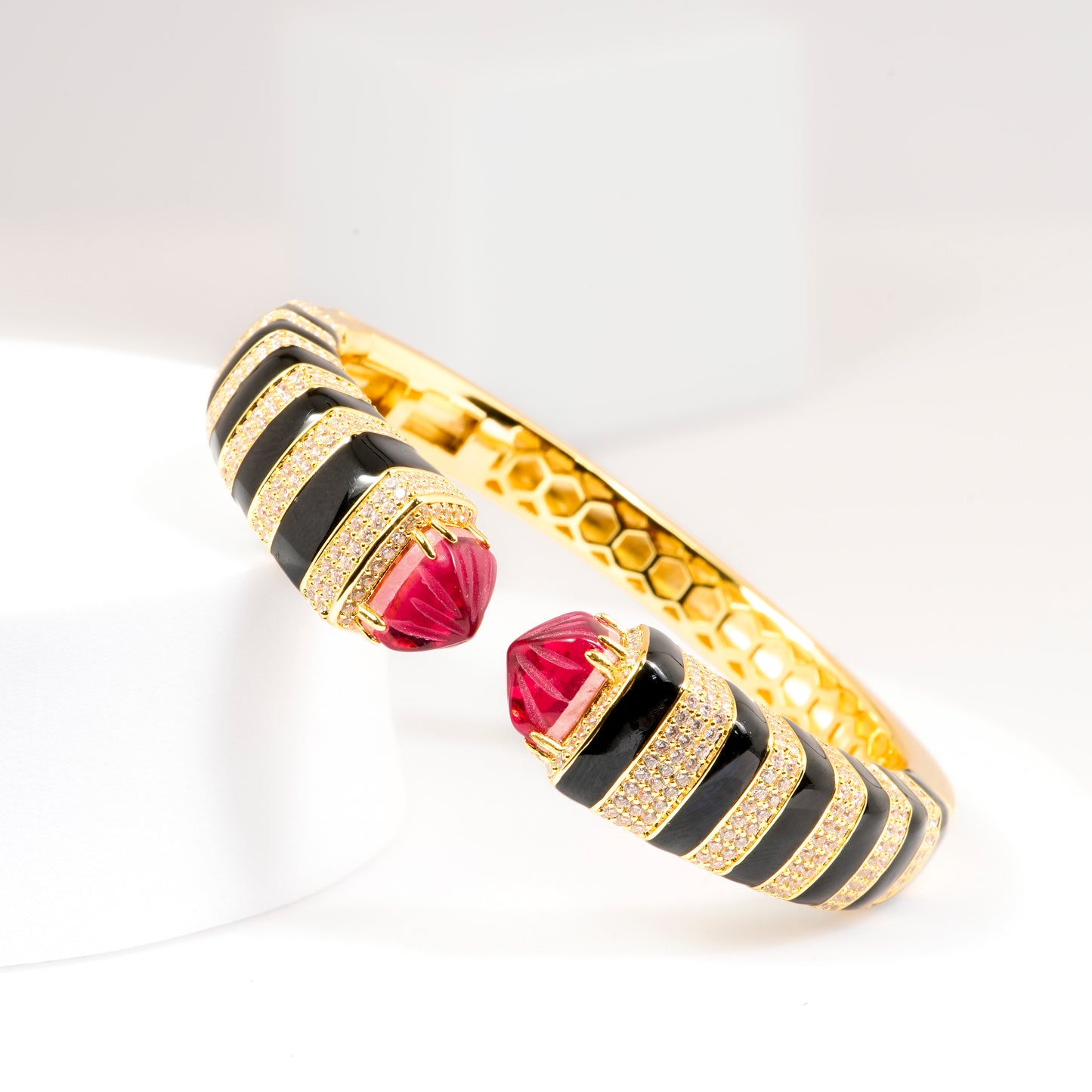 Gold Finish Open Cuff Bracelet with Black Enamel Stripes and Ruby Red Gemstone Tips | Bold Statement Jewelry for Festive and Evening Glamour