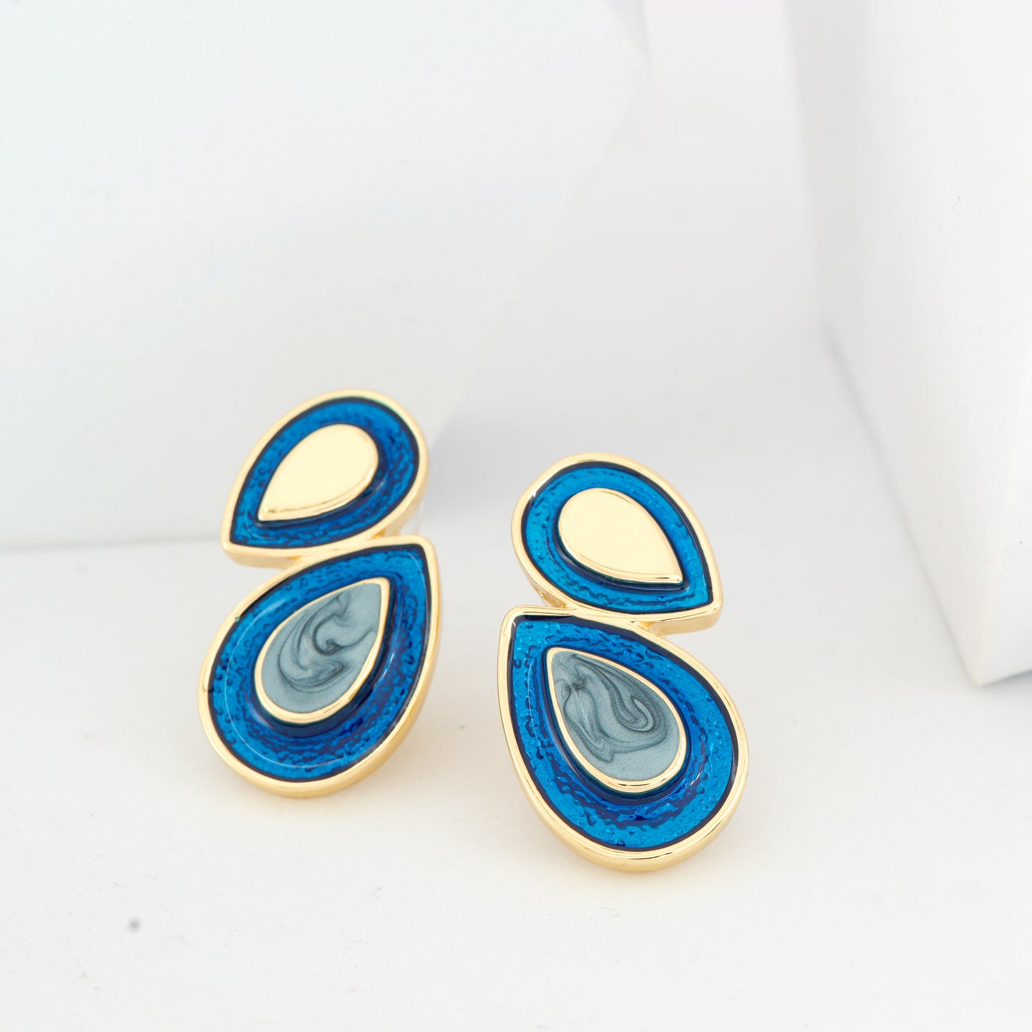 Elegant Dual-Tone Blue Enamel and Gold-Plated Teardrop Earrings with Artistic Marble Finish for Festive and Modern Styling