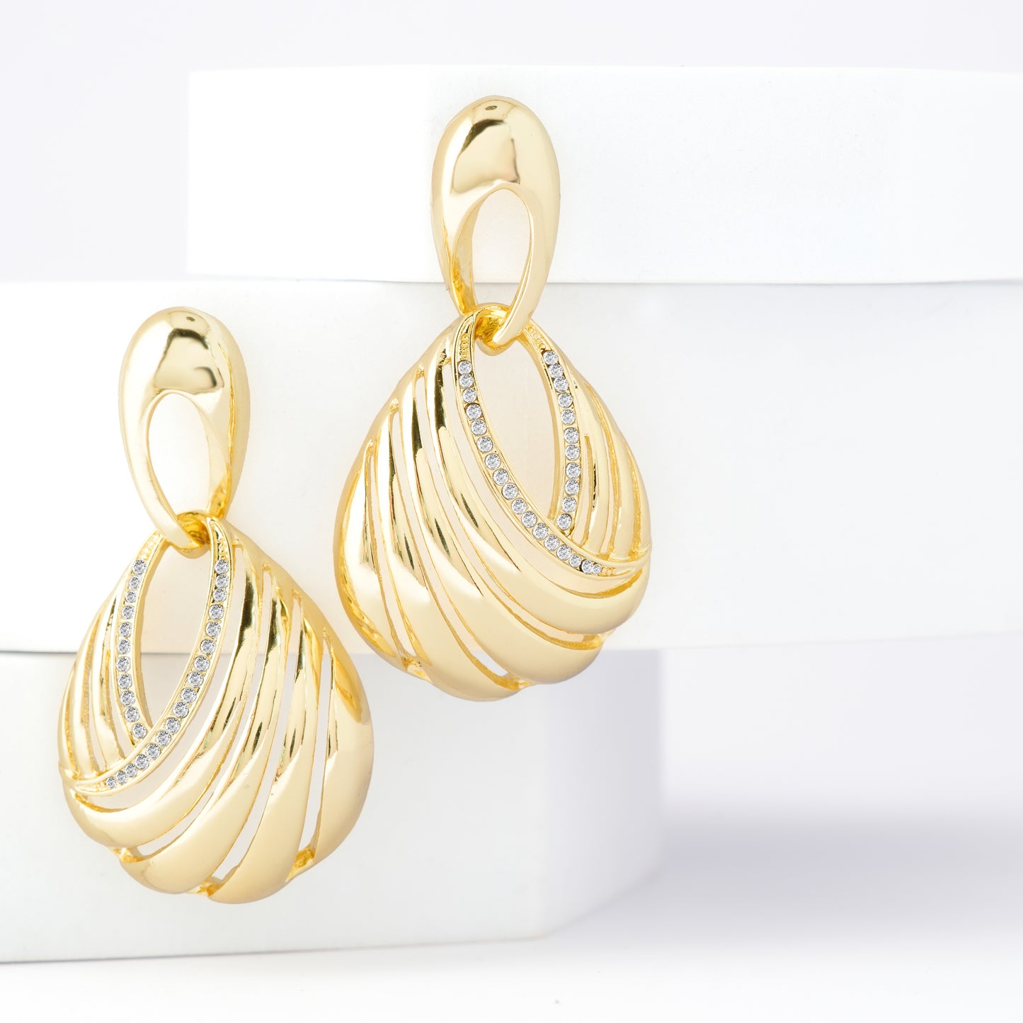 Gold-Plated Teardrop Swirl Earrings with Diamond-Like Accents for Timeless Elegance and Modern Sophistication