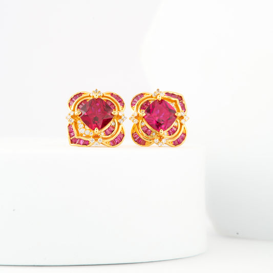 Radiant Ruby Red Stud Earrings with Diamond Accents in a Gold Floral Frame – Luxury Jewelry for Weddings, Festive Celebrations, and Elegant Evenings