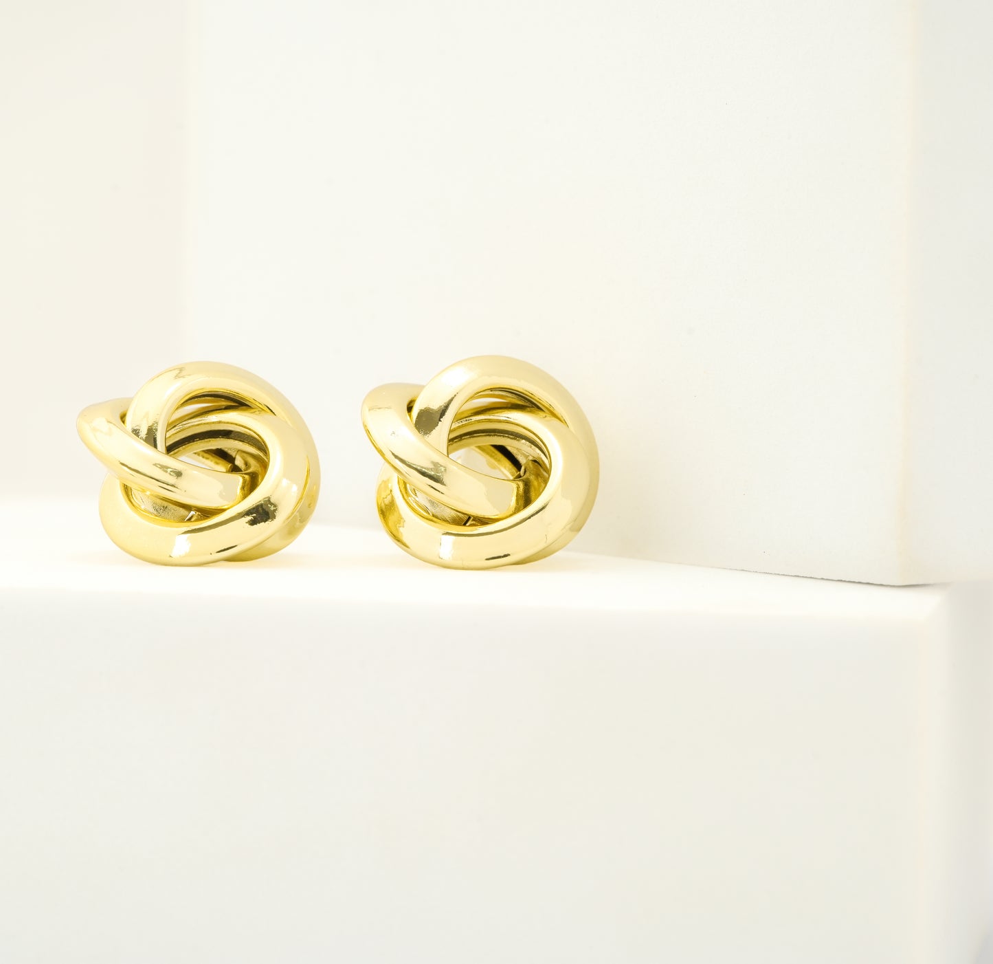 Classic Gold-Plated Interlocked Knot Stud Earrings with High-Polish Finish for Timeless Elegance
