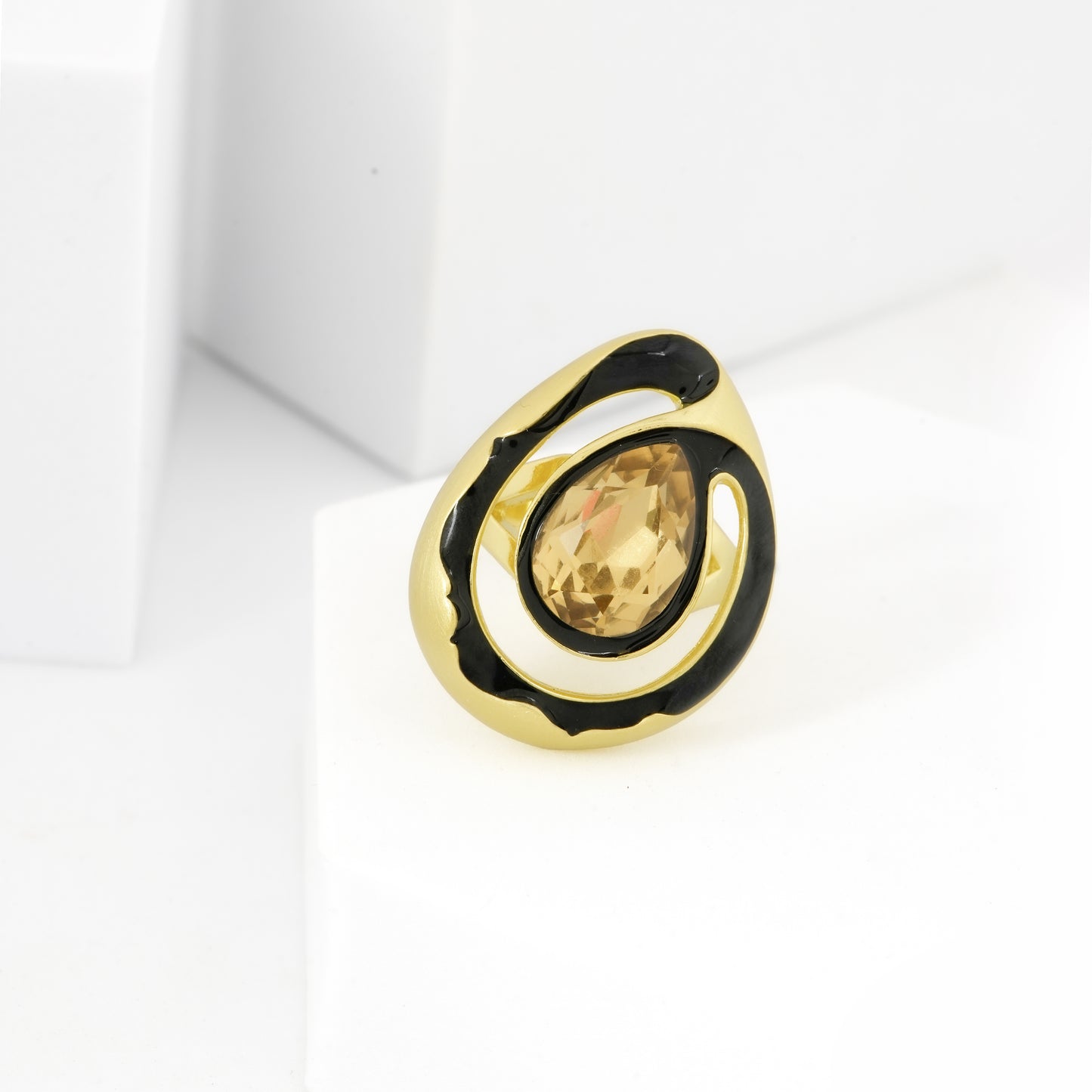 Gold Finish Oval Champagne Stone Ring with Black Enamel Halo and Designer Abstract Setting | Modern Cocktail Jewelry for Parties and Festive Nights