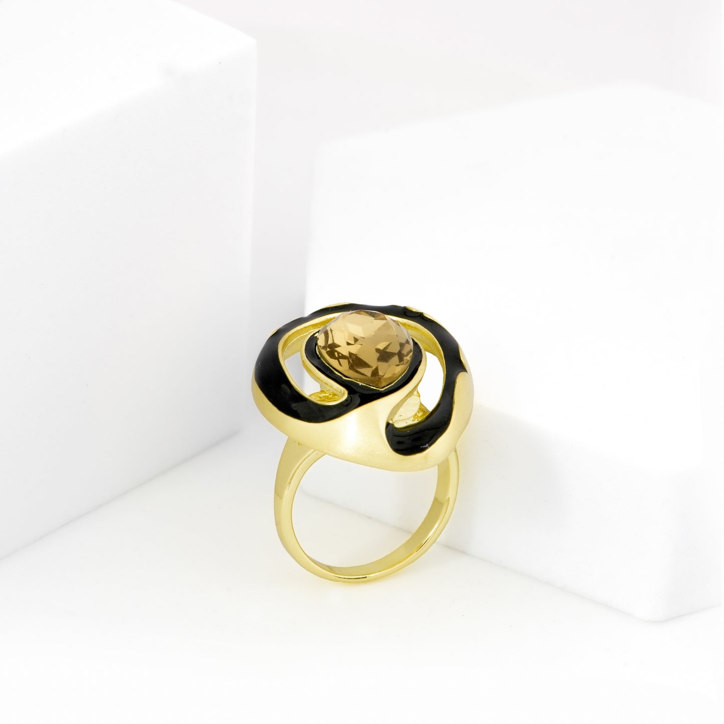 Gold Finish Oval Champagne Stone Ring with Black Enamel Halo and Designer Abstract Setting | Modern Cocktail Jewelry for Parties and Festive Nights