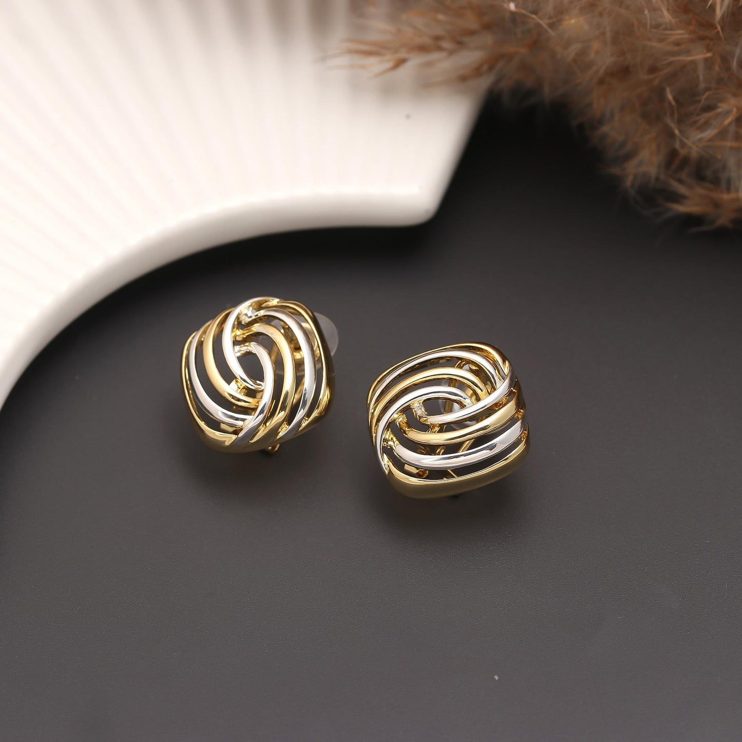 Gold-Plated Geometric Openwork Stud Earrings with Layered Cutout Detailing and Polished Finish for Contemporary Elegance