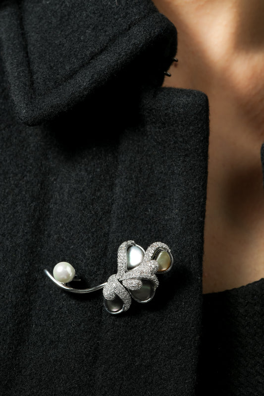 Pavé Bow Brooch with Tahitian-Style Pearl Accents – Silver-Tone Couture Bar Brooch with Clear CZ Pavé, Iridescent Drop Pearls & White Pearl Tip | Luxury Bridal & Festive Statement Pin