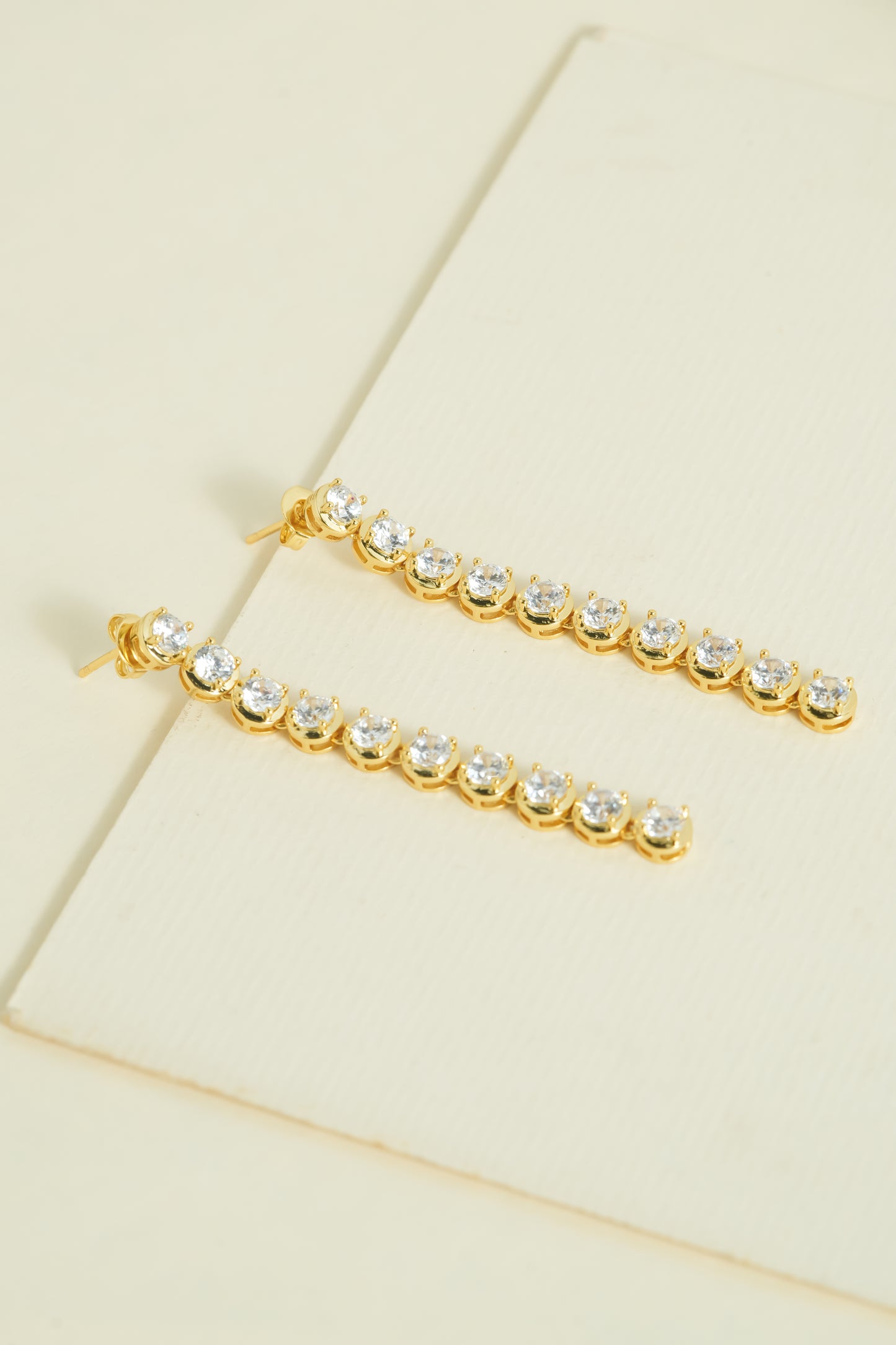 Golden Cascade Drop Earrings | Gold-Tone Vertical Moissanite Style Drop with Round-Cut Sparkling Stones | Elegant Evening and Cocktail Jewellery for Women