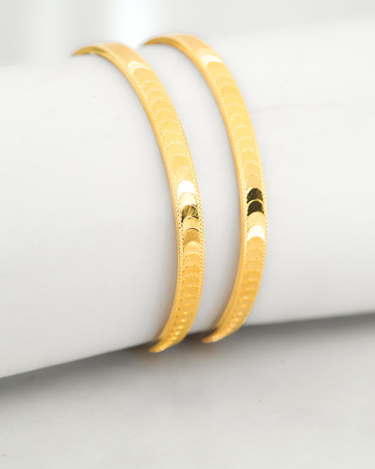 Rhythmic Wave Bangles