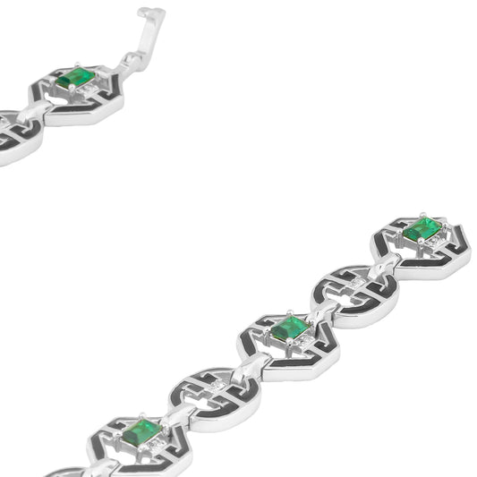 Art Deco Inspired Silver-Tone Statement Necklace with Black Enamel Detailing and Green Stone Accents